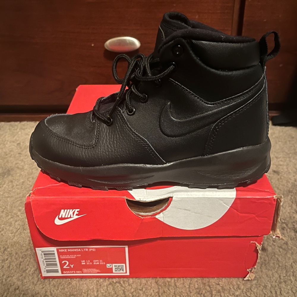 Kids size 2 Nike boats all black. New in box.